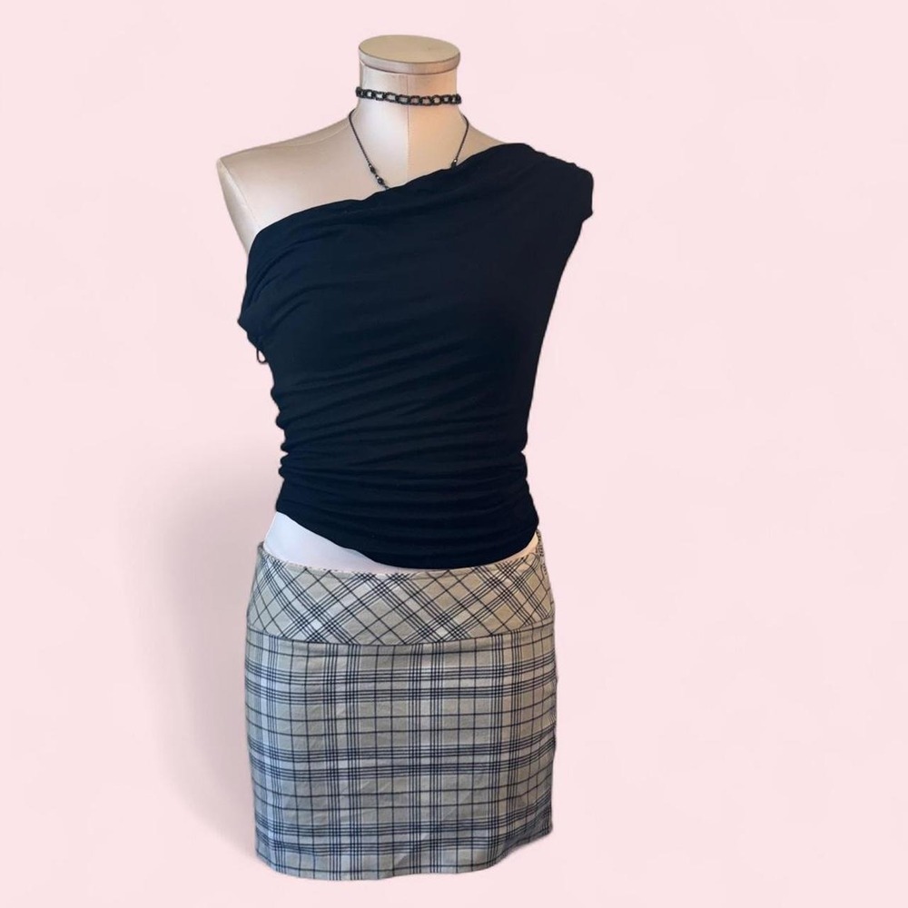 Ardene's plaid mini skort with a fitted low-rise silhouette